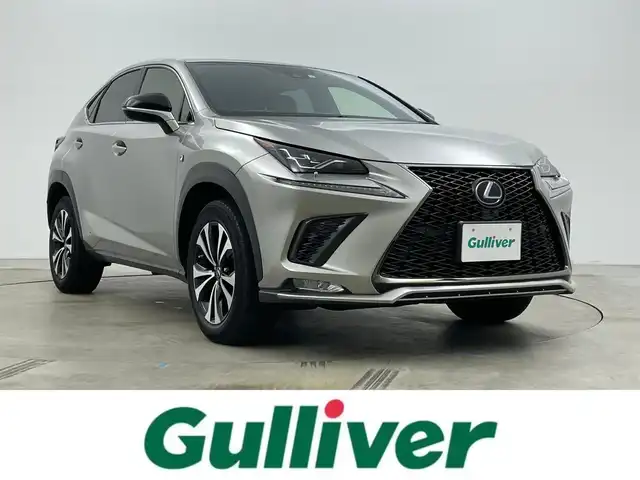 レクサス ＮＸ 300h Fスポーツ 岡山県 2019(令1)年 3.6万km ソニックチタニウム パノラマルーフ/純正ナビ/【Bluetooth/フルセグTV/CD/DVD】/三眼ＬＥＤヘッドライト/オートハイビーム/バックカメラ/レーダークルーズコントロール/純正ドライブレコーダー/型番:DRT-H68A/ビルトインＥＴＣ２．０/ブラインドスポットモニター/前席パワーシート/シートメモリー/前席シートヒーター/前席エアシート/ステアリングヒーター/パドルシフト/純正18インチアルミホイール/衝突軽減ブレーキシステム/ヘッドアップディスプレイ/オートブレーキホールド/左サイドカメラ有/取扱説明書