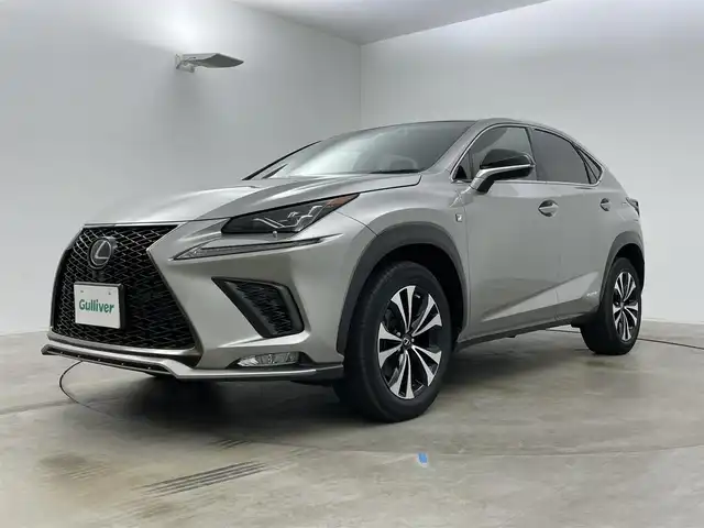 レクサス ＮＸ 300h Fスポーツ 岡山県 2019(令1)年 3.6万km ソニックチタニウム パノラマルーフ/純正ナビ/【Bluetooth/フルセグTV/CD/DVD】/三眼ＬＥＤヘッドライト/オートハイビーム/バックカメラ/レーダークルーズコントロール/純正ドライブレコーダー/型番:DRT-H68A/ビルトインＥＴＣ２．０/ブラインドスポットモニター/前席パワーシート/シートメモリー/前席シートヒーター/前席エアシート/ステアリングヒーター/パドルシフト/純正18インチアルミホイール/衝突軽減ブレーキシステム/ヘッドアップディスプレイ/オートブレーキホールド/左サイドカメラ有/取扱説明書