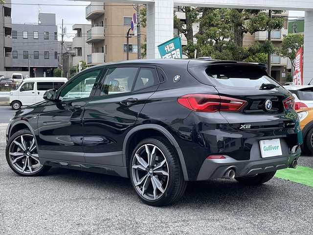 ＢＭＷ Ｘ２ xDrive20i MスポーツX 東京都 2018(平30)年 2.7万km サファイアブラックP 新車時保証書　整備記録簿　取扱説明書/インテリジェントセーフティー/レーンディパーチャーウォーニング/アダプティブクルーズコントロール/アイドリングストップ/純正HDDナビ/CD/DVD/REC/USB/BT/バックカメラ　ルームミラー内臓ETC【DSRC】/ドライブレコーダー【前後】/フロントパワーシート【運転席メモリー付】/レザーシート/Fシートヒーター/LEDヘッドライト/オートライト/パワーバックドア/スマートキー×２/パドルシフト付き革巻きハンドル/コーナーセンサー/純正20インチアルミ