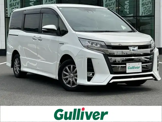 トヨタ ノア ハイブリッド Si ダブルバイビーⅡ 岡山県 2020(令2)年 6.8万km ホワイトパールクリスタルシャイン 純正ナビ　/Bカメラ　/衝突軽減　/両側パワースライドドア　/セーフティセンス　/レーンキープ　/クルーズコントロール　/シートヒーター　/クリアランスソナー　/横滑り防止　/ドラレコ　/Bluetooth　/ETC　/コーナーセンサー
