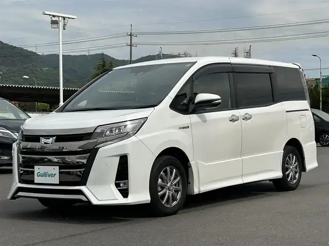 トヨタ ノア ハイブリッド Si ダブルバイビーⅡ 岡山県 2020(令2)年 6.8万km ホワイトパールクリスタルシャイン 純正ナビ　/Bカメラ　/衝突軽減　/両側パワースライドドア　/セーフティセンス　/レーンキープ　/クルーズコントロール　/シートヒーター　/クリアランスソナー　/横滑り防止　/ドラレコ　/Bluetooth　/ETC　/コーナーセンサー