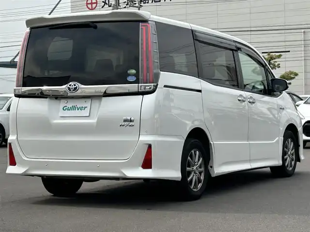 トヨタ ノア ハイブリッド Si ダブルバイビーⅡ 岡山県 2020(令2)年 6.8万km ホワイトパールクリスタルシャイン 純正ナビ　/Bカメラ　/衝突軽減　/両側パワースライドドア　/セーフティセンス　/レーンキープ　/クルーズコントロール　/シートヒーター　/クリアランスソナー　/横滑り防止　/ドラレコ　/Bluetooth　/ETC　/コーナーセンサー