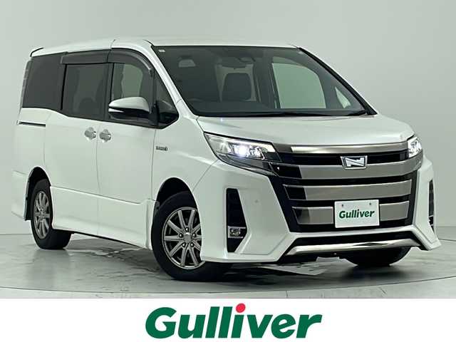 トヨタ ノア ハイブリッド Si ダブルバイビーⅡ 大阪府 2020(令2)年 6.8万km ホワイトパールクリスタルシャイン トヨタセーフティセンス/　・プリクラッシュセーフティ/　・レーンディパーチャーアラート/　・オートマチックハイビーム/純正メモリナビ/　　CD/DVD/BT/フルセグTV　/バックカメラ　/両側パワースライドドア/クルーズコントロール　　/LEDオートライト/フォグランプ/合皮ハーフレザーシート/シートヒーター　/社外15インチアルミホイール/クリアランスソナー　/スマートキー/ビルトインETC2.0