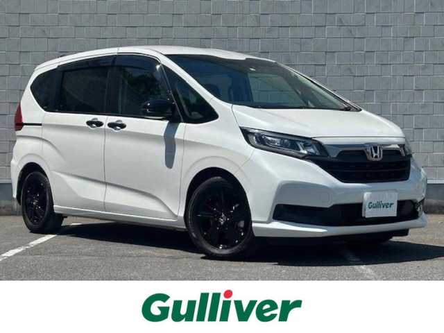 ホンダ フリード ハイブリット G ブラックスタイル 大阪府 2022(令4)年 2.6万km プラチナホワイトパール 純正９インチナビ　/フルセグ　/Ｂｌｕｅｔｏｏｔｈ　/バックカメラ　/両側パワースライドドア　/レーダークルーズコントロール　/ＬＥＤヘッドライト　/オートハイビーム　/ＥＴＣ　/フロアーマット　/サイドバイザー