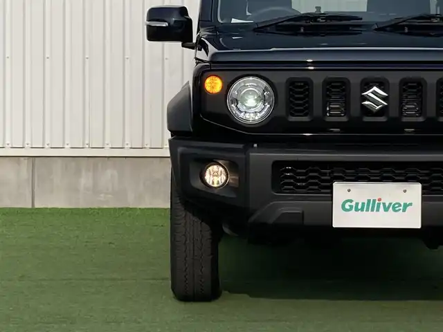 スズキ ジムニー シエラ JC 香川県 2025(令7)年 0.2万km ブルーイッシュブラックパール3 登録時走行距離：1505km/パナソニックナビ/　CD DVD BT フルセグTV/バックカメラ/クルーズコントロール/ダウンヒルアシストコントロール/衝突被害軽減装置/レーンキープアシスト/クリアランスソナー/LEDヘッドライト/オートライト/フォグランプ/ヘッドライトウォッシャー/横滑り防止装置/アイドリングストップ/シートヒーター/ビルトインETC/ドライブレコーダー/革巻きステアリング/ステアリングスイッチ/プッシュスタート/スマートキー
