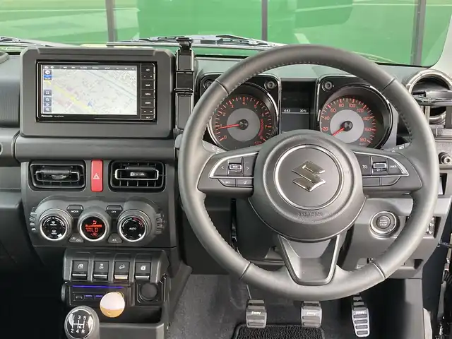 スズキ ジムニー シエラ JC 香川県 2025(令7)年 0.2万km ブルーイッシュブラックパール3 登録時走行距離：1505km/パナソニックナビ/　CD DVD BT フルセグTV/バックカメラ/クルーズコントロール/ダウンヒルアシストコントロール/衝突被害軽減装置/レーンキープアシスト/クリアランスソナー/LEDヘッドライト/オートライト/フォグランプ/ヘッドライトウォッシャー/横滑り防止装置/アイドリングストップ/シートヒーター/ビルトインETC/ドライブレコーダー/革巻きステアリング/ステアリングスイッチ/プッシュスタート/スマートキー