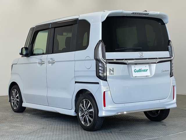 ホンダ Ｎ ＢＯＸ カスタム L 栃木県 2022(令4)年 1.7万km プレミアムサンライトホワイトパール 純正ナビ/（SD/DVD/ワンセグTV/Bluetooth/iPod/USB/AUX）/バックカメラ/エアロ/（サイド・リアスポイラー）/コーナーセンサー/ビルトインETC/片側パワースライドドア/シートヒーター/フロントフォグランプ/ドアバイザー/オートライト/LEDヘッドライト/横滑り防止装置/スマートキー/プッシュスタート/アイドリングストップ/ステアリングスイッチ/電動格納ミラー/純正アルミホイール/純正フロアマット