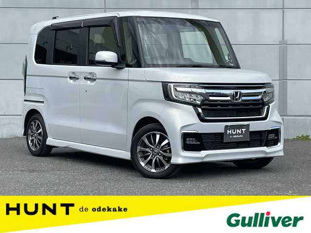 ホンダ Ｎ ＢＯＸ カスタム L 千葉県 2022(令4)年 1.7万km プレミアムサンライトホワイトパール 純正ナビ/（SD/DVD/ワンセグTV/Bluetooth/iPod/USB/AUX）/バックカメラ/エアロ/（サイド・リアスポイラー）/コーナーセンサー/ビルトインETC/片側パワースライドドア/シートヒーター/フロントフォグランプ/ドアバイザー/オートライト/LEDヘッドライト/横滑り防止装置/スマートキー/プッシュスタート/アイドリングストップ/ステアリングスイッチ/電動格納ミラー/純正アルミホイール/純正フロアマット