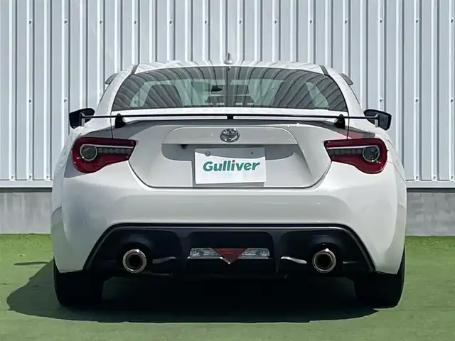 トヨタ ８６ GT リミテッド ブラックPKG 香川県 2019(令1)年 6.9万km クリスタルホワイトパール 登録時走行距離：68459km/純正7型ナビゲーション/→フルセグTV/→CD再生/バックカメラ/ETC/クルーズコントロール/ステアリングリモコン/革巻きステアリング/パドルシフト/プッシュスタート/シートヒーター/LEDオートライト/フォグランプ/横滑り防止機能/純正フロアマット/ハーフレザーシート/スマートキー