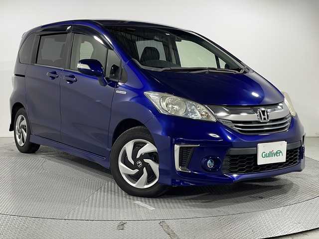 ホンダ フリード ハイブリット プレミアムエディション 広島県 2015(平27)年 7万km コバルトブルーパール 純正ナビ/両側パワースライドドア/バックカメラ/クルーズコントロール/ハーフレザーシート/ビルトインETC/スマートキー/HIDヘッドランプ/純正15インチホイールキャップ