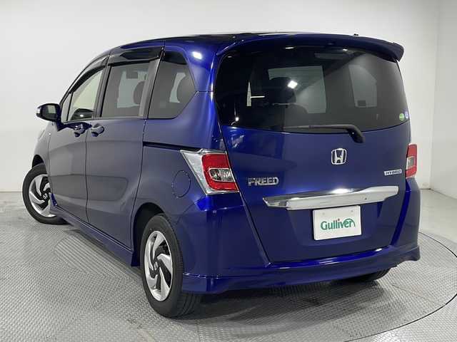 ホンダ フリード ハイブリット プレミアムエディション 広島県 2015(平27)年 7万km コバルトブルーパール 純正ナビ/両側パワースライドドア/バックカメラ/クルーズコントロール/ハーフレザーシート/ビルトインETC/スマートキー/HIDヘッドランプ/純正15インチホイールキャップ