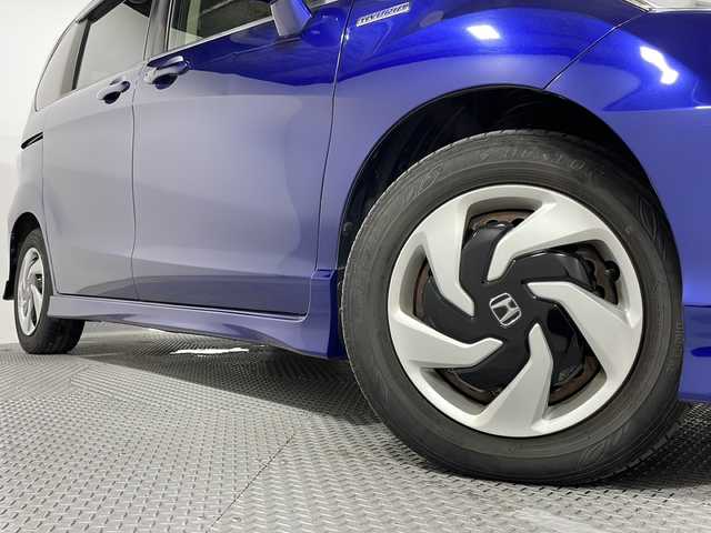 ホンダ フリード ハイブリット プレミアムエディション 広島県 2015(平27)年 7万km コバルトブルーパール 純正ナビ/両側パワースライドドア/バックカメラ/クルーズコントロール/ハーフレザーシート/ビルトインETC/スマートキー/HIDヘッドランプ/純正15インチホイールキャップ