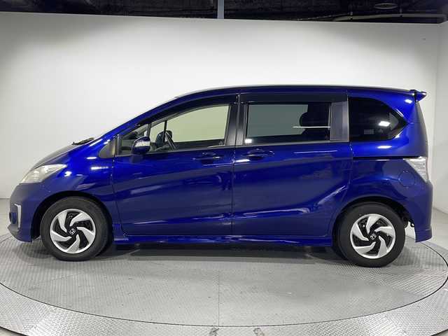 ホンダ フリード ハイブリット プレミアムエディション 広島県 2015(平27)年 7万km コバルトブルーパール 純正ナビ/両側パワースライドドア/バックカメラ/クルーズコントロール/ハーフレザーシート/ビルトインETC/スマートキー/HIDヘッドランプ/純正15インチホイールキャップ