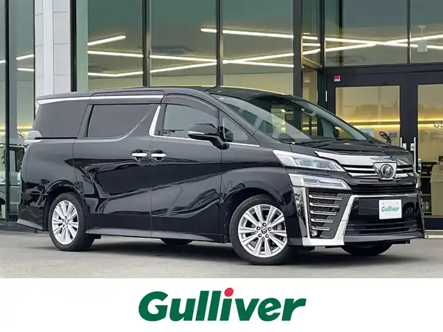 トヨタ ヴェルファイア Z Aエディション 東京都 2018(平30)年 9.5万km ブラック トヨタ純正10インチT-Connectナビ/・フルセグTV/・Bluetooth接続/前後ドライブレコーダー（Gloryse A120）/レーダークルーズコントロール/プリクラッシュセーフティーシステム(PCS)/レーントレーシングアシスト（LTA）/ロードサインアシスト（RSA）/先行車先行車発進告知/クリアランスソナー/フリップダウンモニター/両側パワースライドドア/バックカメラ/電子パーキング/オートホールド/オートハイビーム/純正フロアマット/純正18インチアルミホイール/100V充電/ドアバイザー/ETC/スマートキー/スペアキー
