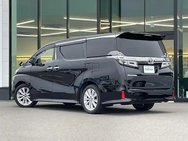 トヨタ ヴェルファイア Z Aエディション 東京都 2018(平30)年 9.5万km ブラック トヨタ純正10インチT-Connectナビ/・フルセグTV/・Bluetooth接続/前後ドライブレコーダー（Gloryse A120）/レーダークルーズコントロール/プリクラッシュセーフティーシステム(PCS)/レーントレーシングアシスト（LTA）/ロードサインアシスト（RSA）/先行車先行車発進告知/クリアランスソナー/フリップダウンモニター/両側パワースライドドア/バックカメラ/電子パーキング/オートホールド/オートハイビーム/純正フロアマット/純正18インチアルミホイール/100V充電/ドアバイザー/ETC/スマートキー/スペアキー