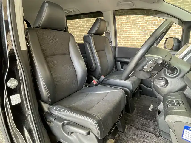 ホンダ ステップワゴン スパーダ Z クールスピリット 岩手県 2012(平24)年 14.3万km プレミアムスパークルブラックパール ギャザズ後席モニター/クルーズコントロール/両側パワースライドドア/横滑り防止装置/アイドリングストップ/パドルシフト/ヒルスタートアシスト機能/アクティブコーナリングライト/純正ナビ/バックカメラ/ETC/HIDヘッドライト/フォグライト/純正16インチアルミホイール