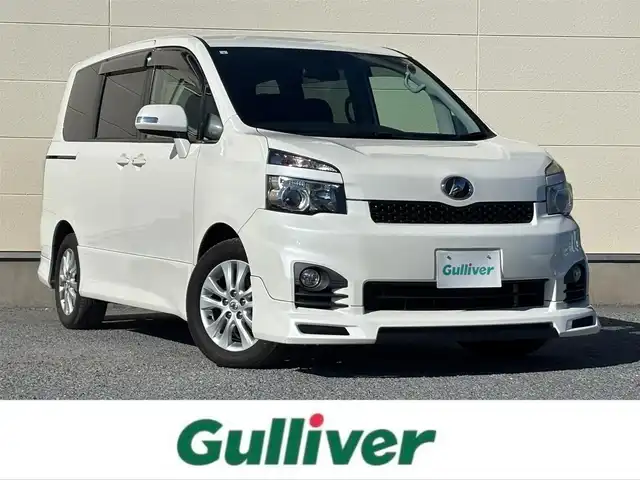 トヨタ ヴォクシー ZS 茨城県 2013(平25)年 7.9万km ホワイトパールクリスタルシャイン 純正ナビ/　(AM/FM/CD/DVD/Bluetooth/フルセグ)/バックカメラ/社外admirationエアロ/　(フロント/サイド/リアアンダー)/社外マフラー/純正アルミホイール/片側パワースライドドア/ETC/W(後席)エアコン/パドルシフト/フォグランプ/ISOFIX/パワーステアリング/オートライト/Wエアバック/取扱説明書