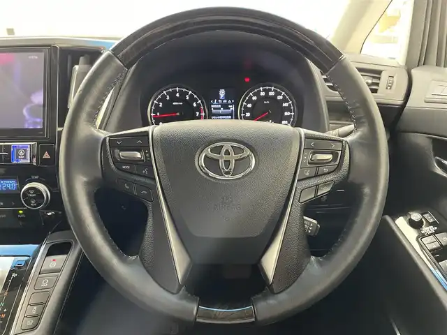 トヨタ ヴェルファイア Z Gエディション 滋賀県 2015(平27)年 4.5万km ホワイトパールクリスタルシャイン 禁煙車/アルパインナビ/CD/DVD/Bluetooth/フルセグTV/バックカメラ/ツインムーンルーフ/フリップダウンモニター/モデリスタエアロ/ETC/デジタルインナーミラー/クルーズコントロール/電動パーキング/ステアリングスイッチ/両側パワースライドドア/ステアリングヒーター/パワーシート/オットマン/純正アルミホイール