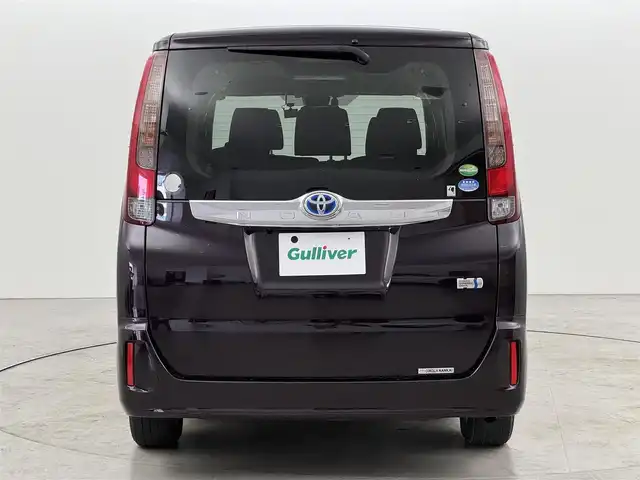 トヨタ ノア ハイブリッド G 福岡県 2016(平28)年 4.8万km ボルドーマイカメタリック 後席モニター　/純正８型ナビ（フルセグＴＶ）　/バックカメラ　/ビルトインＥＴＣ　/前方ドラレコ　/クルーズコントロール　/衝突軽減ブレーキ　/レーンキープ　/先行車発進　/片側電動スライドドア　/シートヒーター　/ＬＥＤ