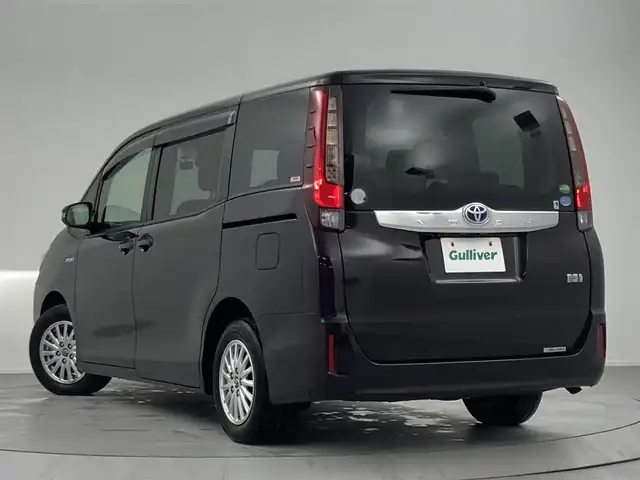 トヨタ ノア ハイブリッド G 熊本県 2016(平28)年 4.8万km ボルドーマイカメタリック 後席モニター　/純正８型ナビ（フルセグＴＶ）　/バックカメラ　/ビルトインＥＴＣ　/前方ドラレコ　/クルーズコントロール　/衝突軽減ブレーキ　/レーンキープ　/先行車発進　/片側電動スライドドア　/シートヒーター　/ＬＥＤ