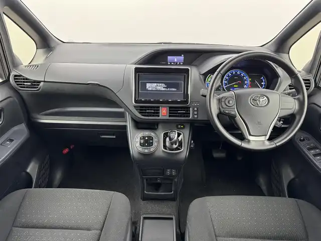 トヨタ ノア ハイブリッド G 福岡県 2016(平28)年 4.8万km ボルドーマイカメタリック 後席モニター　/純正８型ナビ（フルセグＴＶ）　/バックカメラ　/ビルトインＥＴＣ　/前方ドラレコ　/クルーズコントロール　/衝突軽減ブレーキ　/レーンキープ　/先行車発進　/片側電動スライドドア　/シートヒーター　/ＬＥＤ