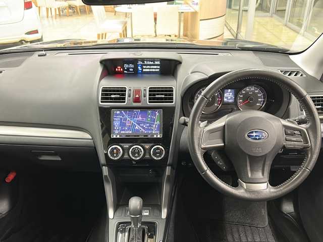 スバル フォレスター 2．0i－L 道央・札幌 2014(平26)年 9.4万km ダークグレーメタリック ・4WD/・社外ナビ/フルセグTV/DVD/CD/SD/BT/・クルーズコントロール/・パドルシフト/・横滑り防止/・アイドリングストップ/・ETC/・SI-DRIVE/・X-MODE/・HID/・フロントフォグ/・キーレス/・電格ミラー