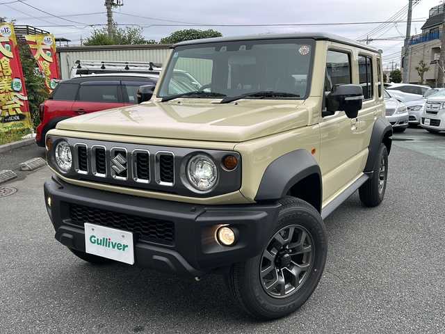スズキ ジムニー ノマド FC 埼玉県 2025(令7)年 0.1万km アイボリー ワンオーナー/登録時走行754km/スズキセーフティサポート/ ・アダプティブクルーズコントロール/ ・パーキングセンサー/ ・デュアルカメラブレーキサポート/ ・前後誤発進抑制機能/ ・後退時ブレーキサポート/ ・車線逸脱警報機能/ ・ふらつき警報機能/ ・ハイビームアシスト/ ・先行車発進お知らせ機能/ ・標識認識機能/LEDヘッドランプ/本革巻きステアリング/ステアリングスイッチ/撥水加工ファブリックシート/前席シートヒーター/純正15インチアルミホイール/キーレスプッシュスタートシステム/禁煙車/保証書/取扱説明書/スペアキー1ヶ