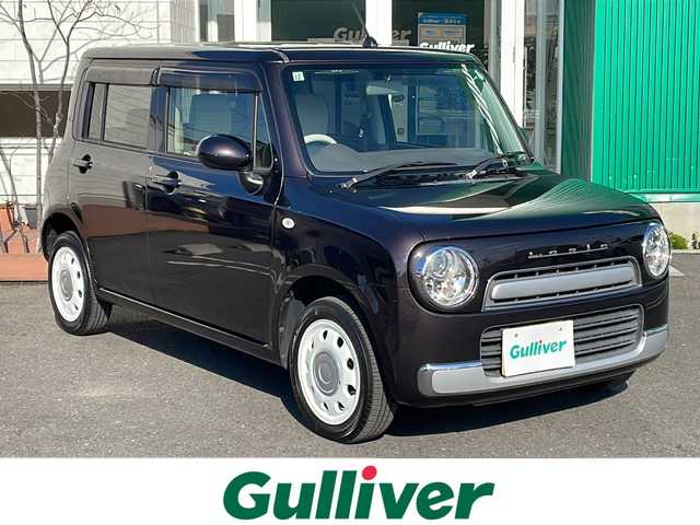 スズキ ラパン ショコラ G 青森県 2013(平25)年 9.2万km アーバンブラウンパールメタリック 4WD/社外SDナビ/Bluetooth・CD・DVD・USB/運転席シートヒーター/合皮専用シート/ベンチシート/オートライト/スマートキー/プッシュスタート/アイドリングストップ車