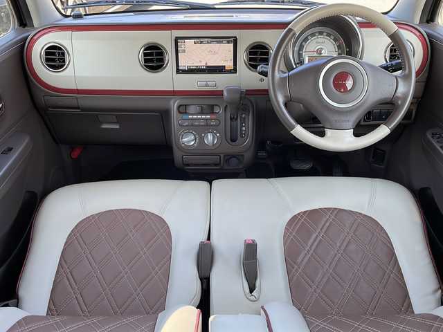 スズキ ラパン ショコラ G 青森県 2013(平25)年 9.2万km アーバンブラウンパールメタリック 4WD/社外SDナビ/Bluetooth・CD・DVD・USB/運転席シートヒーター/合皮専用シート/ベンチシート/オートライト/スマートキー/プッシュスタート/アイドリングストップ車