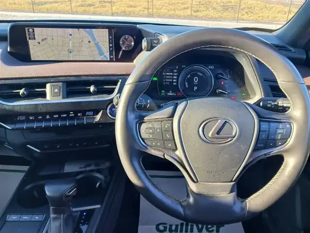 レクサス ＵＸ 250h ブラウンエディション 富山県 2020(令2)年 4.6万km グラファイトブラックガラスフレーク 純正10.3型ナビ/フルセグTV/ハンズフリーパワーバックドア/パノラミックビューモニター/ビルトインETC2.0/ドライブレコーダー/レーダークルーズコントロール/クリアランスソナー/セーフティシステムプラス/・プリクラッシュセーフティ/・レーントレーシングアシスト/・オートマチックハイビーム/・先行車発進告知機能/・ロードサインアシスト/ブラインドスポットモニター/パーキングサポートブレーキ/LEDヘッドランプ/革巻きステアリング/ステアリングヒーター/ブラウン合皮シート/前席パワーシート/シートヒーター/純正17インチアルミホイール/スマートエントリー/スタートシステム/禁煙車