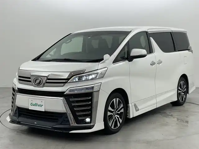 トヨタ ヴェルファイア Z Gエディション 福岡県 2018(平30)年 8.3万km ホワイトパールクリスタルシャイン ＴＲＤエアロ　/後席モニター　/純正１０型ナビ　/バックカメラ　/ビルトインＥＴＣ　/ドラレコ　/ＡＣＣ　/コーナーセンサー　/衝突被害軽減ブレーキ　/レーンキープ　/両側電動スライドドア　/パワーバックドア　/パワーシート