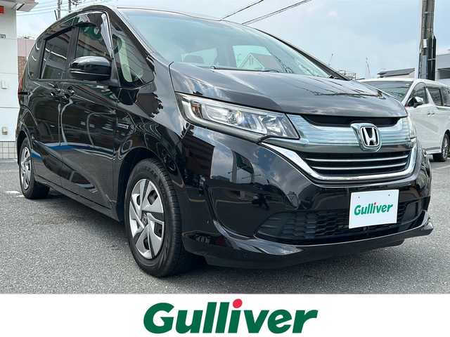 ホンダ フリード ハイブリット G ホンダセンシング 大阪府 2018(平30)年 6.3万km プレミアムスパークルブラックパール 社外ナビ（ＣＤ　ＢＴ）/スマートキー　/プッシュスタート　/バックモニター/路外逸脱抑制機能/衝突軽減ブレーキ/レーンキープアシスト/電動格納ミラー/ウインカーミラー　/ビルトインＥＴＣ　/両側電動スライドドア　/レーダークルーズコントロール　/ホンダセンシング　/ＬＥＤヘッドライト　/オートライト