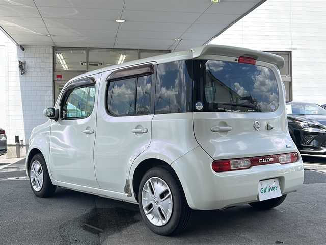 日産 キューブ 15X 京都府 2010(平22)年 4.6万km ホワイトパール ワンオーナー車/純正ナビ(MP310-W)/ワンセグTV/Bluetooth Audio/CD/DVD/バックカメラ/ETC/電格ミラー/純正ドアバイザー/純正フロアマット/保証書/取扱説明書/スペアキー