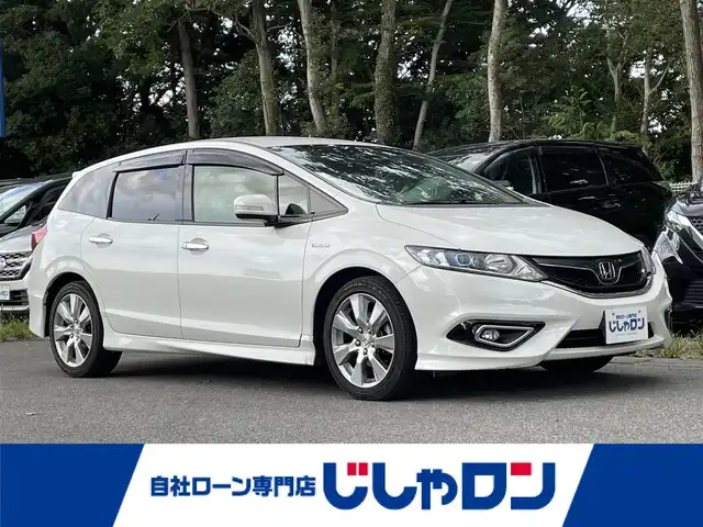 ホンダ ジェイド ハイブリッド X 栃木県 2015(平27)年 13.9万km ホワイトオーキッドパール (株)IDOMが運営する【じしゃロン宇都宮店】の自社ローン専用車両になります。こちらは現金またはオートローンご利用時の価格です。自社ローンご希望の方は別途その旨お申付け下さい/禁煙車/７型純正ナビ/バックカメラ/Ｂｌｕｅｔｏｏｔｈ接続/ＣＤ／ＤＶＤ/ワンセグＴＶ/クルーズコントロール/純正アルミホイール/ハーフレザーシート/カーテンエアバック/スマートキー/プッシュスタート
