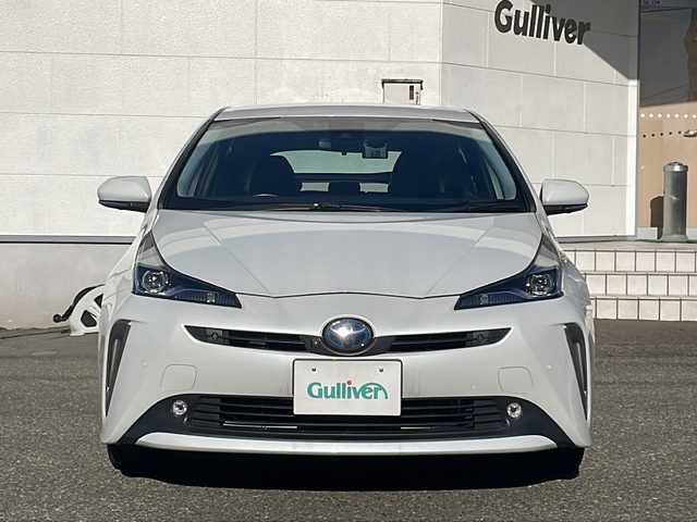 トヨタ プリウス S ツーリングセレクション 福井県 2021(令3)年 6.4万km プラチナホワイトパールマイカ ワンオーナー/純正9インチメモリナビゲーション/（CD/DVD/BT）/フルセグテレビ/360°カメラ/プリクラッシュセーフティ/レーンキープアシスト/アダプティブクルーズコントロール/ブラックレザーシート/クリアランスソナー/純正17インチアルミホイール/ETC2.0（ビルトイン）/LEDヘッドライト/LEDフォグランプ/スペアタイヤ/オートハイビーム/オートライト/AC100V電源/ドライブレコーダー/オートリトラミラー/シートヒーター/ステアリングリモコン/プッシュスタート/スマートキー/保証書/取扱説明書