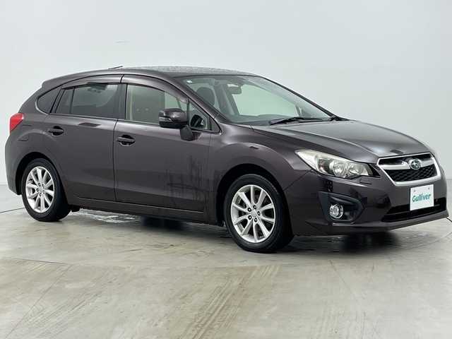 スバル インプレッサ スポーツ 2．0i アイサイト 道央・札幌 2012(平24)年 5.2万km ディープチェリーパール ・4WD/・寒冷地仕様/・社外ナビ（CD＆DVD＆BT＆TV＆AUX）/・アイサイト/・パドルシフト/・ドアミラーヒーター/・HIDヘッドライト/・フォグランプ/・純正AW/・リモコンキー/・スペアキー/・社外AW付スタッドレス積込