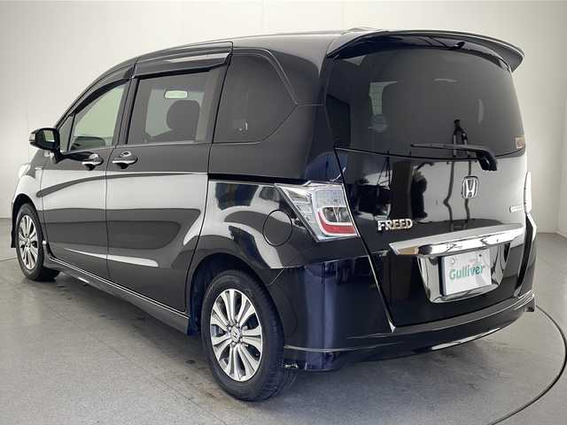 ホンダ フリード ハイブリット ジャストセレクション 宮崎県 2013(平25)年 9.8万km パープル 禁煙車/社外メモリーナビ/CD DVD フルセグTV/バックカメラ/クルーズコントロール/両側パワースライドドア/革巻きステアリング/黒ハーフレザー調シート/スマートキー/電動格納ミラー/オートライト/ETC/純正アルミホイール/カラーコード　パシフィックブルーパールPB６８P