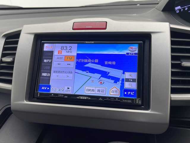 ホンダ フリード ハイブリット ジャストセレクション 宮崎県 2013(平25)年 9.8万km パープル 禁煙車/社外メモリーナビ/CD DVD フルセグTV/バックカメラ/クルーズコントロール/両側パワースライドドア/革巻きステアリング/黒ハーフレザー調シート/スマートキー/電動格納ミラー/オートライト/ETC/純正アルミホイール/カラーコード　パシフィックブルーパールPB６８P