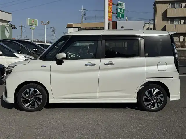 スズキ ソリオ バンディット HV MV 千葉県 2021(令3)年 1.3万km ピュアホワイトP デュアルブレーキサポートシステム/衝突軽減ブレーキ/レーダークルーズコントロール/レーンキープアシスト/コーナーセンサー/純正8インチナビ/フルセグTV/Bluetooth/バックカメラ/両側電動スライドドア/シートヒーター/アイドリングストップ/純正15インチAW/LEDライト/スマートキー/保証書・取説