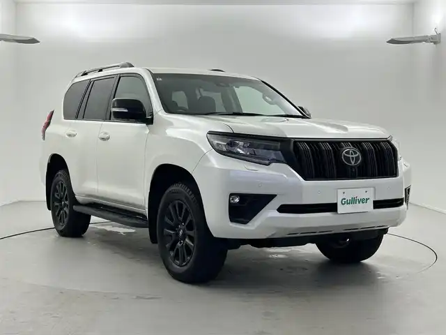 トヨタ ランドクルーザー プラド TX Lパッケージ マットブラED 福井県 2023(令5)年 0.5万km ホワイトパールクリスタルシャイン 4WD/セーフティセンス/・プリクラッシュセーフティ/　・レーンディパーチャーアラート/　・ダプティブハイビームシステム/　・レーダークルーズコントロール/　・オートマチックハイビーム/サンルーフ/純正メモリナビ/　BT/フルセグTV/全方位カメラ/LEDオートライト/フォグランプ/レザーシート/シートヒーター/エアシート/パワーシート/純正18インチアルミホイール/スマートキー/ビルトインETC2.0