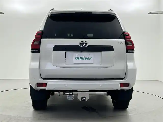 トヨタ ランドクルーザー プラド TX Lパッケージ マットブラED 福井県 2023(令5)年 0.5万km ホワイトパールクリスタルシャイン 4WD/セーフティセンス/・プリクラッシュセーフティ/　・レーンディパーチャーアラート/　・ダプティブハイビームシステム/　・レーダークルーズコントロール/　・オートマチックハイビーム/サンルーフ/純正メモリナビ/　BT/フルセグTV/全方位カメラ/LEDオートライト/フォグランプ/レザーシート/シートヒーター/エアシート/パワーシート/純正18インチアルミホイール/スマートキー/ビルトインETC2.0