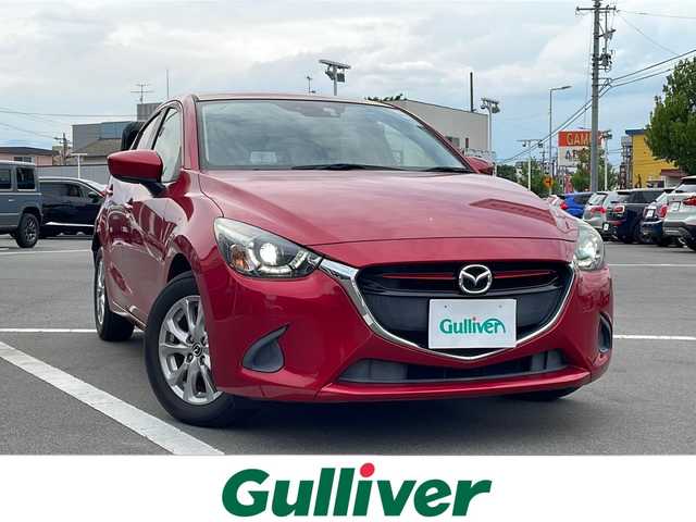 マツダ デミオ 13S ツーリング 長野県 2016(平28)年 5.1万km ソウルレッドプレミアムメタリック 外部検査済み/ワンオーナー/純正SDナビ/(CD/DVD/フルセグTV/Bluetooth/USB)/スマートシティブレーキサポート/ヘッドアップディスプレイ/LEDヘッドライト/スマートキー/ETC/横滑り防止機能/純正15インチアルミホイール/カーテンエアバック/保証書/取扱説明書/スペアキー