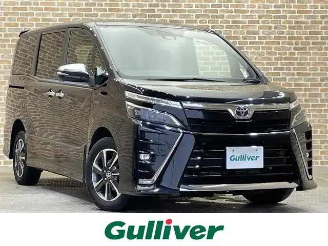 トヨタ ヴォクシー ZS 煌Ⅱ 岩手県 2020(令2)年 3.1万km ブラック ワンオーナー/４WD/純正オプション１２．１型後席ディスプレイ/両側パワースライドドア/クルーズコントロール/トヨタセーフティセンスC/プリクラッシュセーフティ/レーンディパーチャーアラート/オートマチックハイビーム/先行車発進告知機能/クリアランスソナー/パーキングサポートブレーキ/横滑り防止装置/アイドリングストップ/MTモード付AT/純正９インチナビ/フルセグTV/TVキャンセラー/ETC2.0/ドライブレコーダー/バックカメラ/HDMI入力端子/リヤオートエアコン/ロールサンシェード/LEDヘッドランプ/フォグランプ/純正16インチアルミホイール