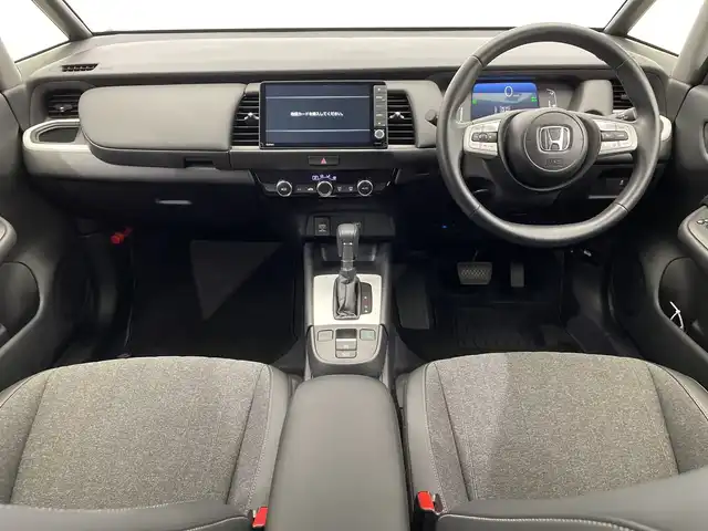 ホンダ フィット e:HEVホーム 栃木県 2024(令6)年 0.7万km クリスタルブラックパール SDナビ/（CD/DVD/Bluetooth/USB/フルセグTV）/バックカメラ/衝突軽減ブレーキ/前後コーナーセンサー/ビルトインETC/オートライト/LEDヘッドライト/横滑り防止装置/スマートキー/プッシュスタート/電動格納ミラー/純正フロアマット
