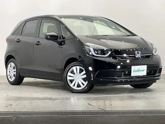 ホンダ フィット e:HEVホーム 栃木県 2024(令6)年 0.7万km クリスタルブラックパール SDナビ/（CD/DVD/Bluetooth/USB/フルセグTV）/バックカメラ/衝突軽減ブレーキ/前後コーナーセンサー/ビルトインETC/オートライト/LEDヘッドライト/横滑り防止装置/スマートキー/プッシュスタート/電動格納ミラー/純正フロアマット
