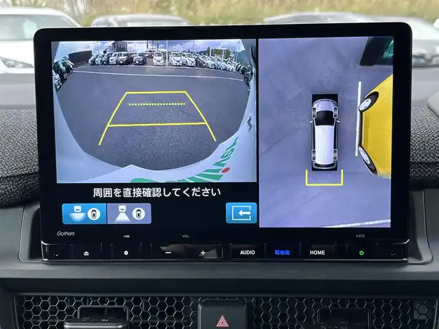 ホンダ ステップワゴン eHEV エアー 奈良県 2022(令4)年 1.6万km プラチナホワイトパール 純正11インチナビ(LXM-237VFLi)/（TV/BT/CD/DVD/AppleCarPlay/AndroidAuto)/レーダークルーズコントロール/アラウンドビューモニター/前後コーナーセンサー/衝突軽減システム/レーンキープアシスト/両側パワースライドドア/後席サンシェード/LEDヘッドライト/オートライト/電動格納ミラー/ETC/純正16インチAW/保証書/取り扱い説明書/スペアキーX1