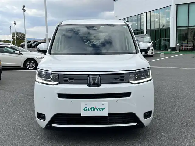 ホンダ ステップワゴン eHEV エアー 奈良県 2022(令4)年 1.6万km プラチナホワイトパール 純正11インチナビ(LXM-237VFLi)/（TV/BT/CD/DVD/AppleCarPlay/AndroidAuto)/レーダークルーズコントロール/アラウンドビューモニター/前後コーナーセンサー/衝突軽減システム/レーンキープアシスト/両側パワースライドドア/後席サンシェード/LEDヘッドライト/オートライト/電動格納ミラー/ETC/純正16インチAW/保証書/取り扱い説明書/スペアキーX1