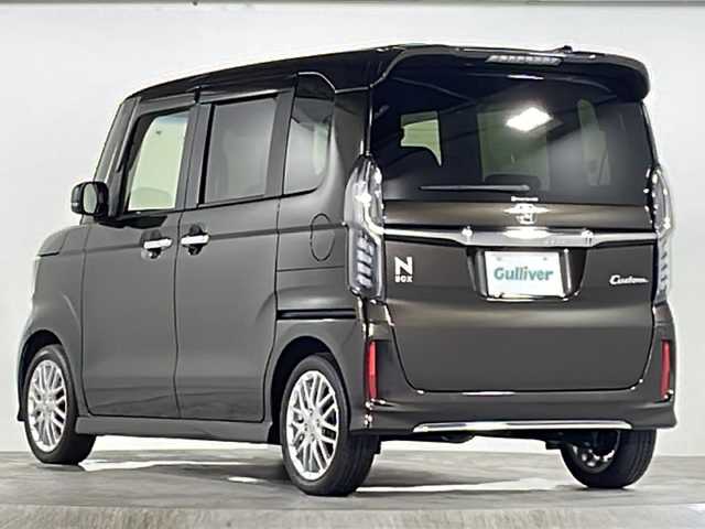 ホンダ Ｎ ＢＯＸ カスタム L ターボ 広島県 2022(令4)年 2.1万km プレミアムグラマラスブロンズP ターボ車/ホンダセンシング/・衝突軽減ブレーキ（CMBS）/・誤発進抑制機能/・歩行者事故低減ステアリング/・路外逸脱抑制機能/・渋滞追従機能付アダプティブクルーズコントロール（ACC）/・車線維持支援システム（LKAS）/・先行車発進お知らせ機能/・標識認識機能/・後方誤発進抑制機能/・オートハイビーム/純正8型ナビ（VXU-227NBi）/・フルセグＴＶ/・Bluetooth/DVD/CD/SD/・iPod/AppleCarPlay/・USB/AM、FM/バックカメラ/ETC/ドライブレコーダー前後/コーナーセンサーRのみ/パドルシフト/アレルクリーンプラスシート/プライムスムース＆トリコットコンビシート/電動パーキングブレーキ/オートホールド/両側電動スライドドア/D/Nシートヒーター/シートバックテーブル/ＬＥＤヘッドライト/純正シルバー塗装＋切削 15インチアルミホイール