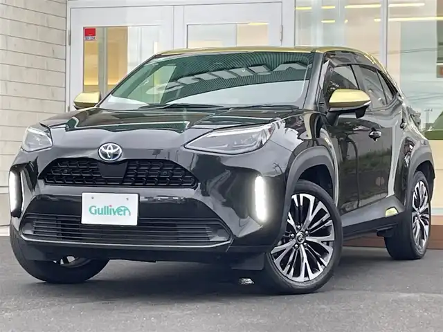 トヨタ ヤリスクロス ハイブリッド Z 道央・札幌 2021(令3)年 4.5万km ブラスゴールドメタリック/ブラックマイカ 2トーン ・４WD/・衝突軽減ブレーキ/・純正ディスプレイオーディオ/　BT＆USB＆TV/・バックカメラ/・ハーフレザーシート/・コーナーセンサー/・レーンキープアシスト/・レーダークルーズコントロール/・パワーバックドア/・D席パワーシート/・ダウンヒルアシスト/・前席シートヒーター/・オートエアコン/・オートライト/・オートリトラミラー/・プッシュスタート/・スマートキー/・前後ドライブレコーダー/・ビルトインETC/・純正フロアマット/・ドアバイザー/・ウィンカーミラー/・フォグライト