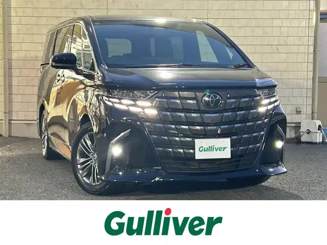 トヨタ アルファード Z 大分県 2024(令6)年 0.9万km ブラック 〇ワンオーナー/〇純正12.3インチディスプレイオーディオ（ナビ付）/　ラジオ・BT・USB・HDMI・フルセグ/〇パノラミックビューモニター/〇革シート/〇左右独立ムーンルーフ/〇ウッドステアリング/〇静電式ステアリングスイッチ/〇カラーヘッドアップディスプレイ/〇ユニバーサルステップ/〇オートハイビームアシスト/〇LEDヘッドライト/〇純正フォグランプ/〇2列目エクゼクティブパワーシート/〇デジタルインナーミラー/〇パワーバックドア/〇スマートキー/〇エンジンプッシュスタート/〇保証書/〇スペアキー